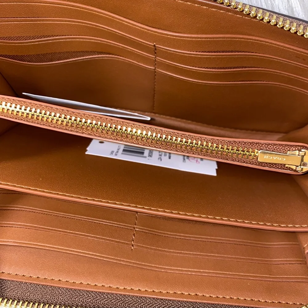 Coach signature with orange print
Accordion wallet New - Picture 5 of 9